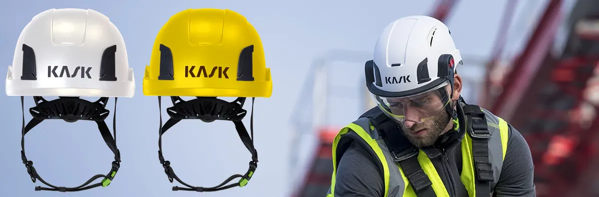 Man wearing a white helmet. red and yellow helmets featured next to the man