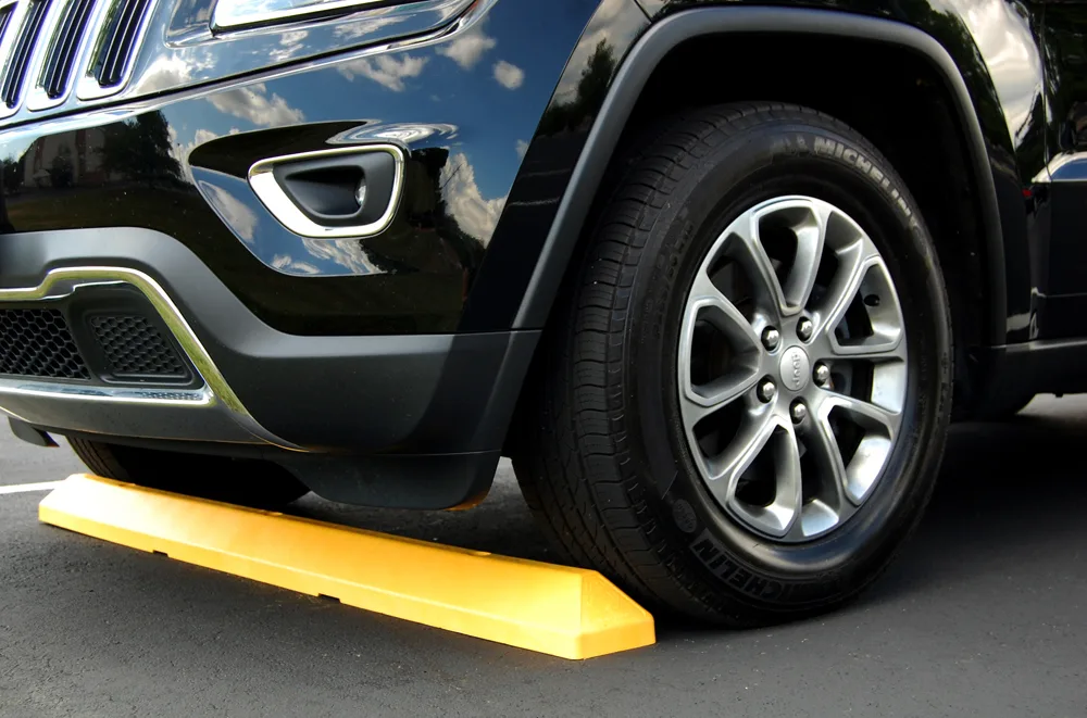 image of yellow parking block